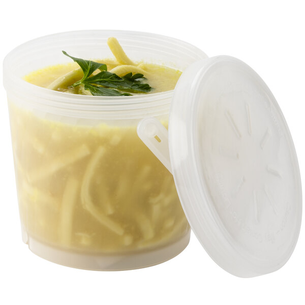 A clear plastic GET soup container with a lid and soup inside.