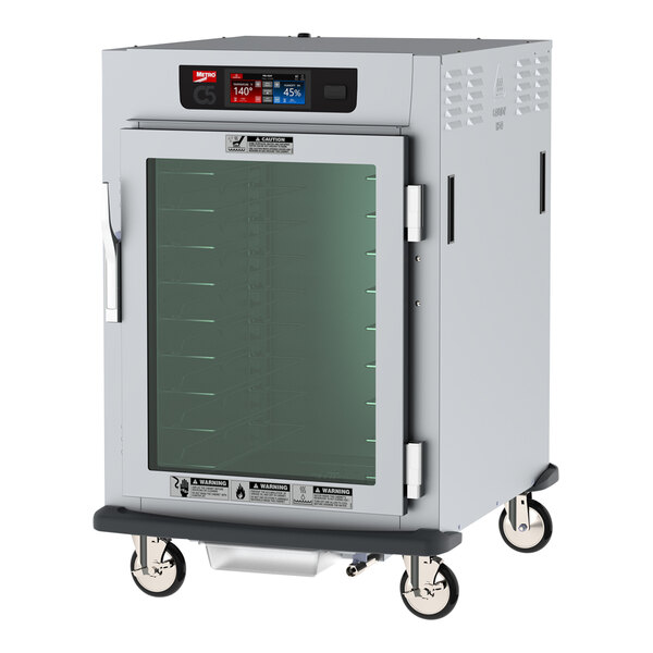 A white Metro C5 9 series holding and proofing cabinet with a clear glass door.