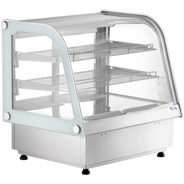 An Avantco white curved refrigerated countertop bakery display case with a clear glass top and three shelves.