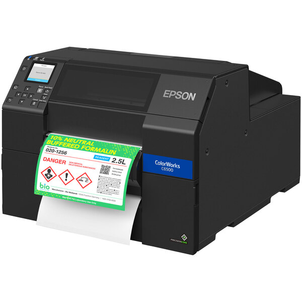 An Epson ColorWorks C6500PU label printer printing a green and white label with red and black symbols.