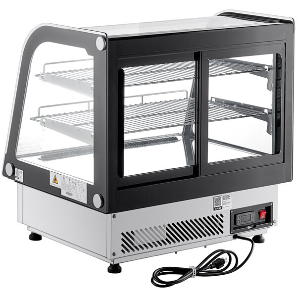 An Avantco black and silver curved refrigerated countertop bakery display case with glass doors.