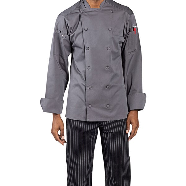 A man wearing a Uncommon Chef Vigor Pro Vent long sleeve chef coat with mesh back in slate.