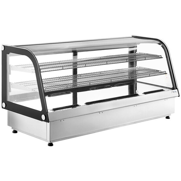A black Avantco curved refrigerated countertop bakery display case with glass doors and shelves inside.