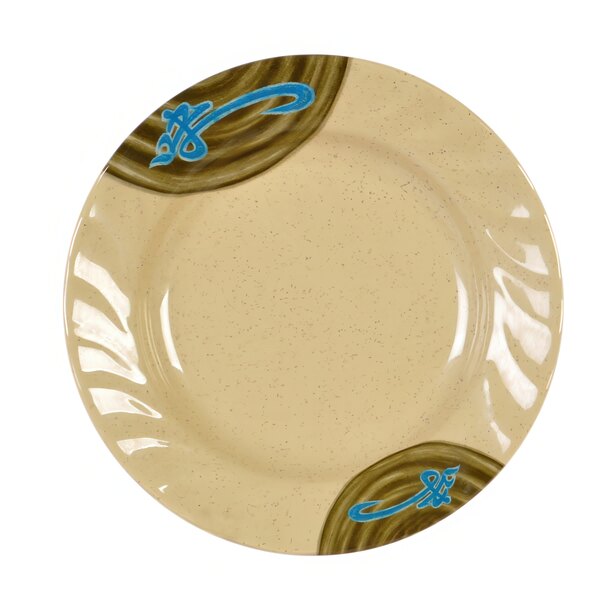 A beige round melamine plate with a blue and brown design on the rim.