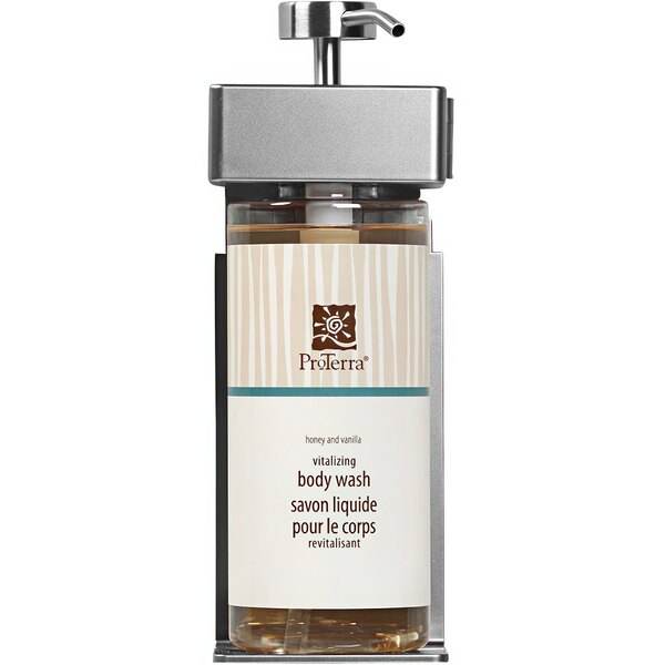 A white oval bottle of ProTerra body wash in a wall-mounted shower dispenser.