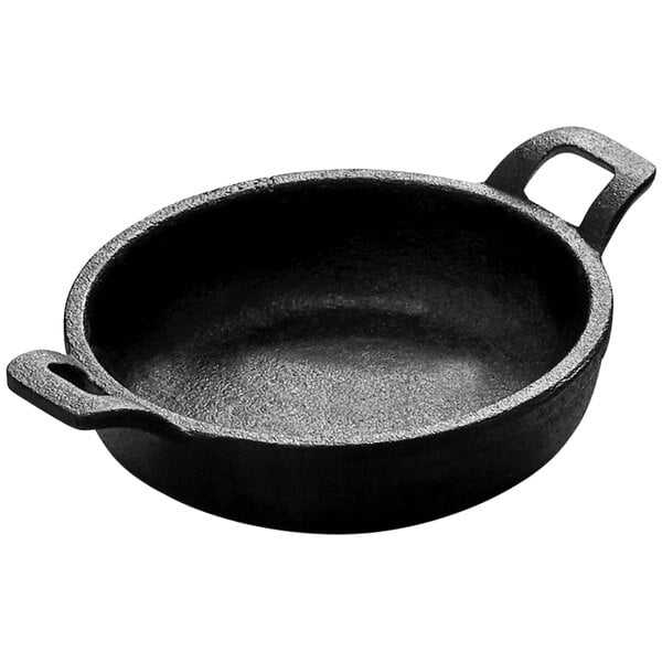 An American Metalcraft pre-seasoned cast iron round casserole dish with handles.