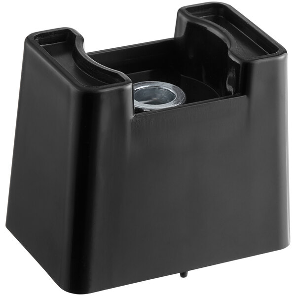 A black plastic ServIt foot with a small hole in it.