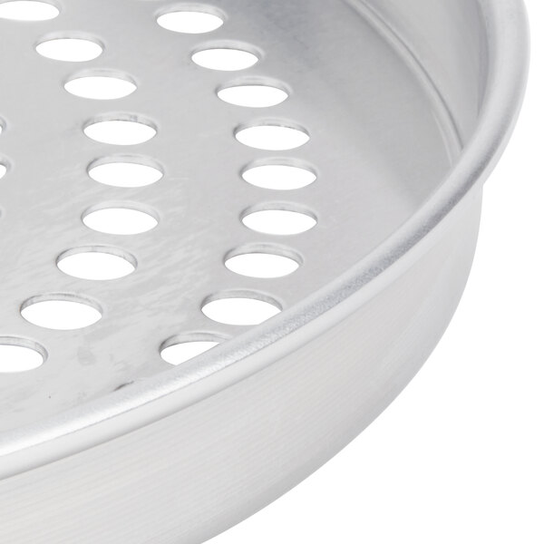 An American Metalcraft metal pizza pan with perforations.