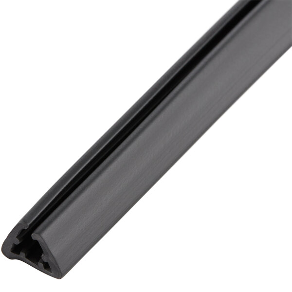 A black plastic strip with a long edge.