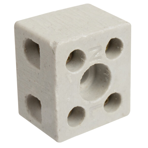 A white ceramic square terminal block with four holes.