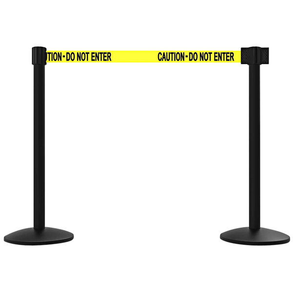 A pair of Banner Stakes yellow and black retractable belt barriers.