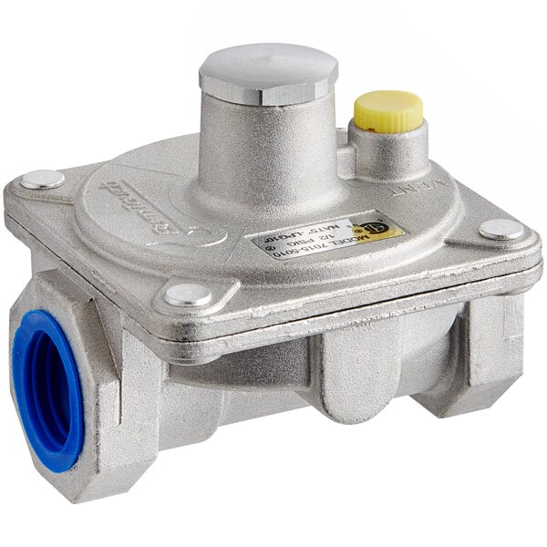A silver metal Regency gas pressure regulator with a yellow knob.