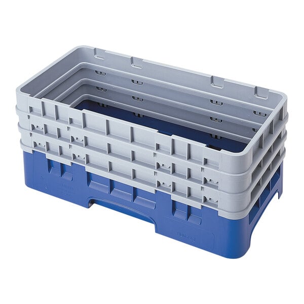 A navy blue and gray plastic Camrack half size open base rack with three extenders.