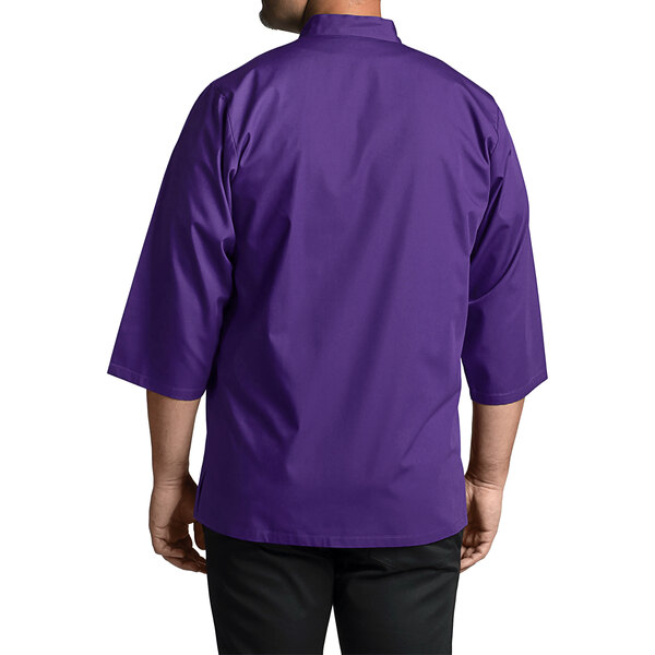 A person wearing a grape-colored Uncommon Chef 3/4 length sleeve chef coat.
