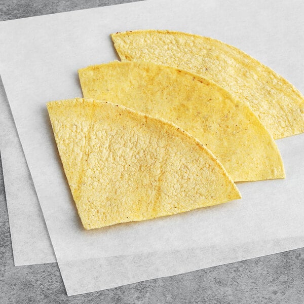 A stack of Mejor yellow unfried corn tortillas.