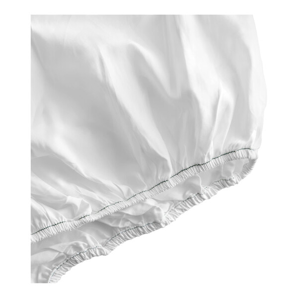 A white queen size fitted sheet made of 100% combed cotton with elastic edges.