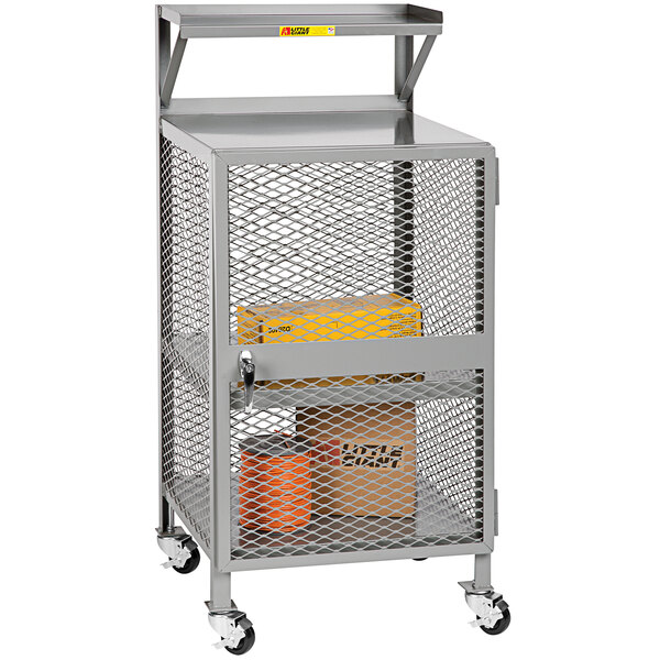 A Little Giant metal shop desk with a box inside.