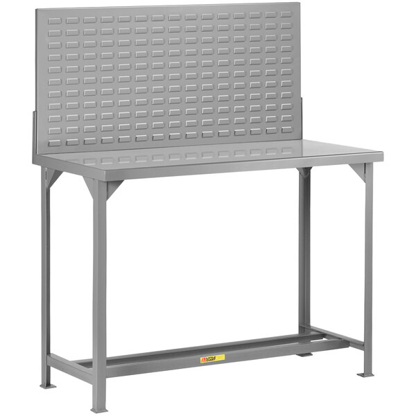 A grey steel Little Giant workbench with a louvered back panel.