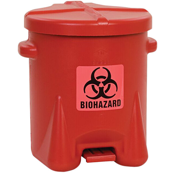 A red Eagle Manufacturing biohazardous waste can with a black biohazard symbol.