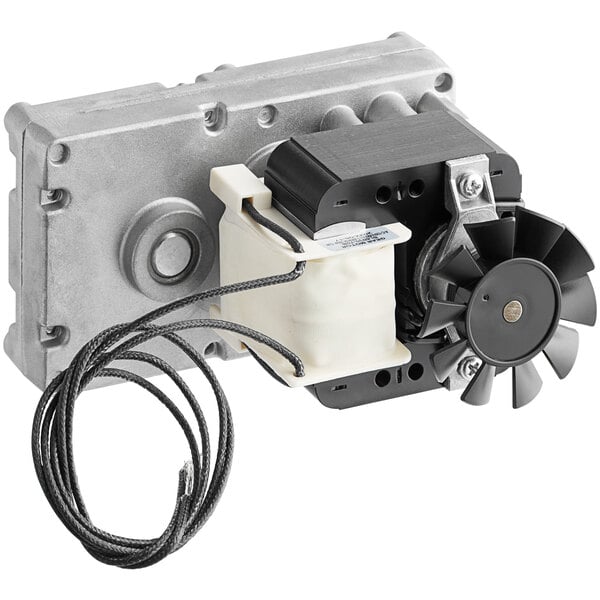 An Avantco motor with a wire attached.