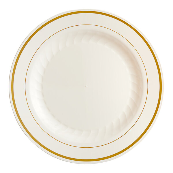 A white plate with gold rim.