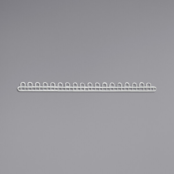 A white plastic strip with holes.