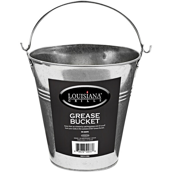 A black Louisiana Grills grease bucket with a label and handle.