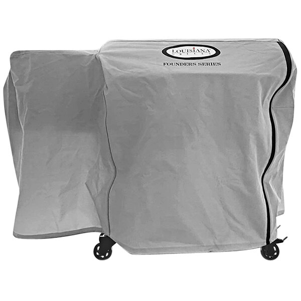 A black Louisiana Grills cover for a grill on wheels.