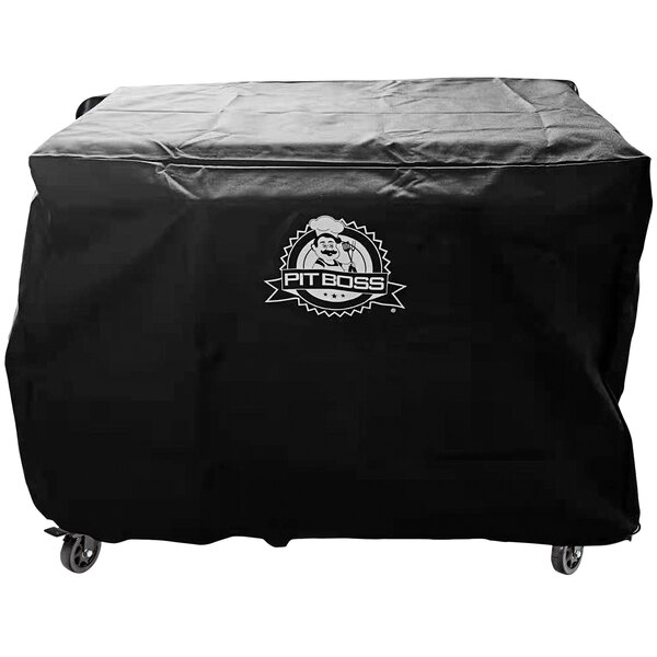 A black Pit Boss grill cover on a grill.