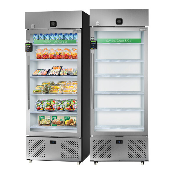 A FoodSpot fresh food vending machine with clear glass doors filled with food on white shelves.