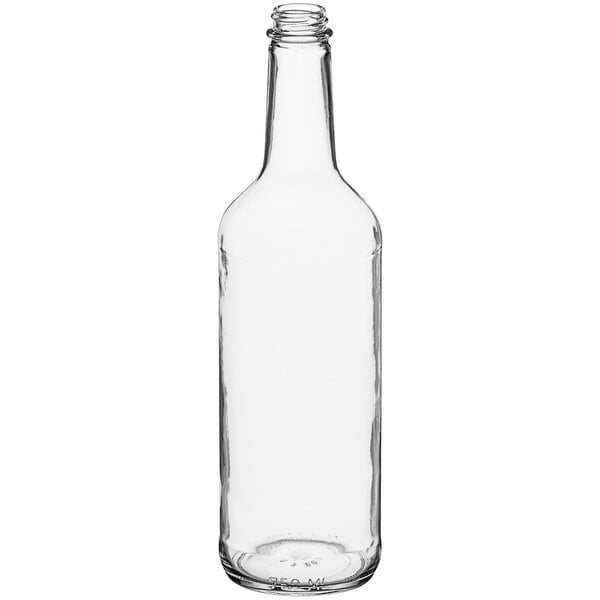 A clear glass Bordeaux wine bottle.
