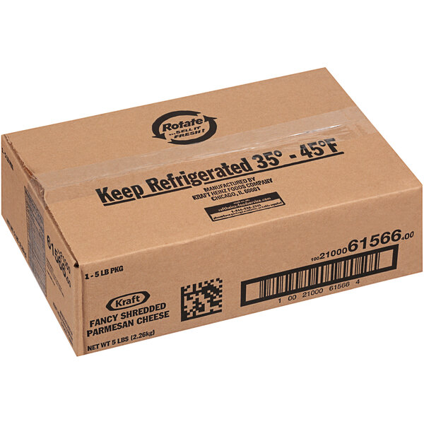A brown box of Kraft Shredded Parmesan Cheese with black text on it.