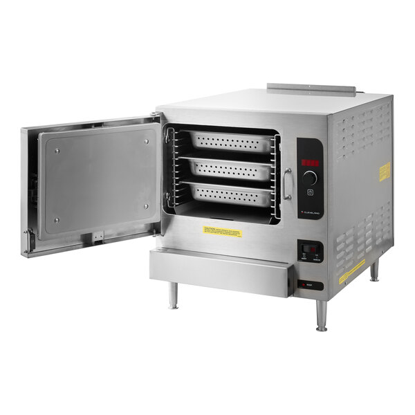 A large stainless steel Cleveland countertop steamer with an open door.