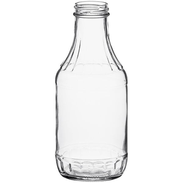 A clear glass BBQ sauce bottle with a black cap.