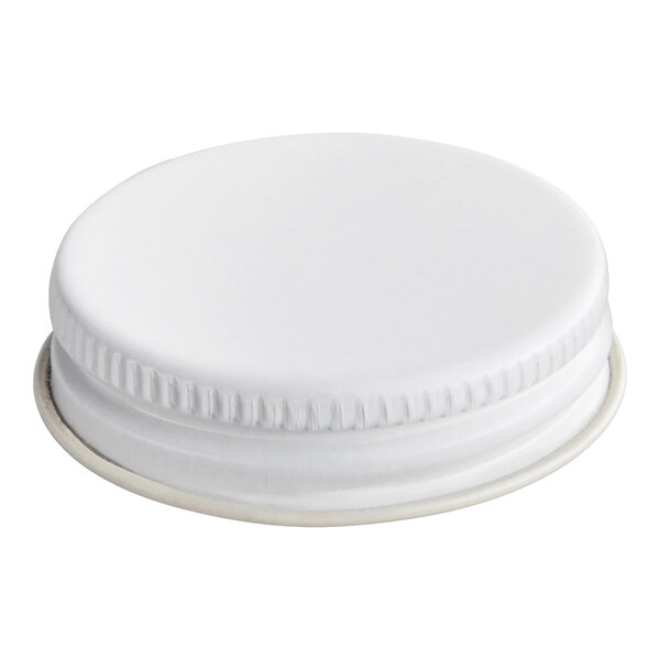A white metal lid with a plastisol liner designed for jars or bottles.