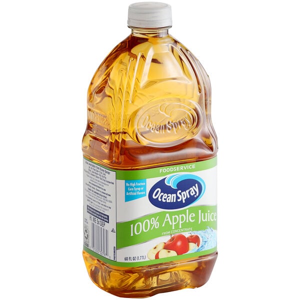 A plastic bottle of Ocean Spray Apple Juice with a label.