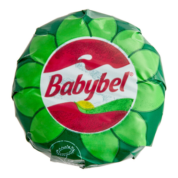 A green and white plastic package of Babybel vegan plant-based cheese with a round green and red wrapper.