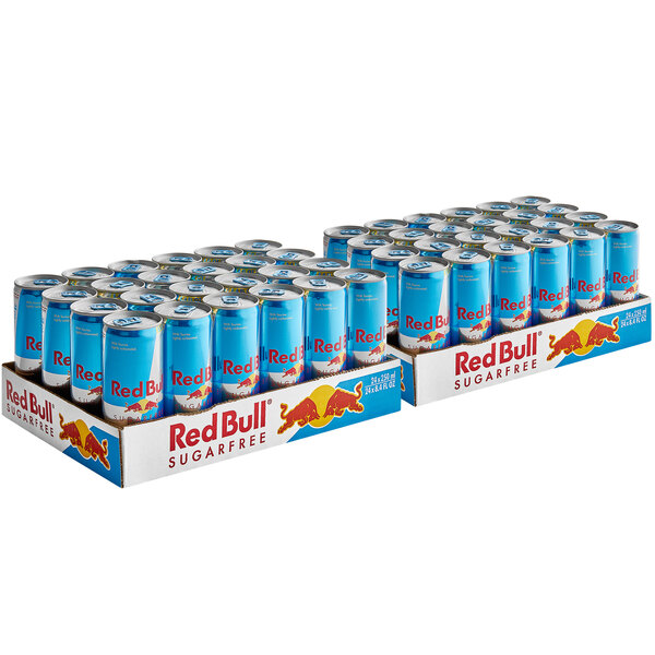 A group of Red Bull Sugar Free energy drink cans.