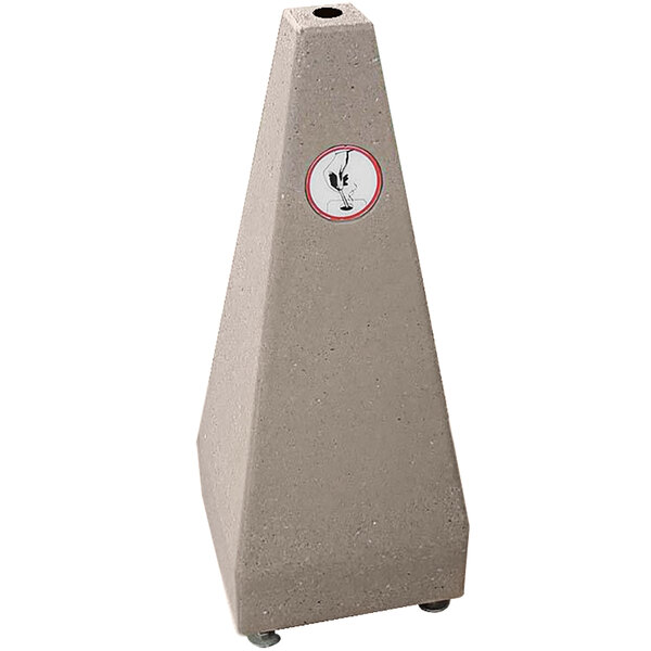 A Wausau Tile concrete pyramid cigarette ash receptacle.