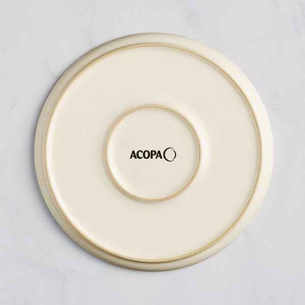 An Acopa Pangea fog white matte coupe porcelain plate.