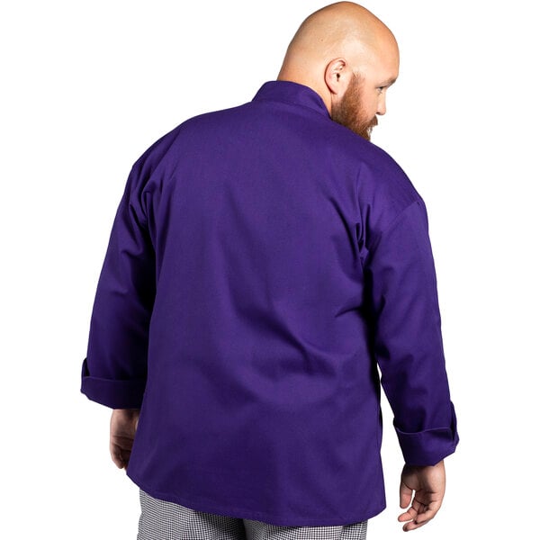 A man in a Uncommon Chef Orleans purple long sleeve chef coat.