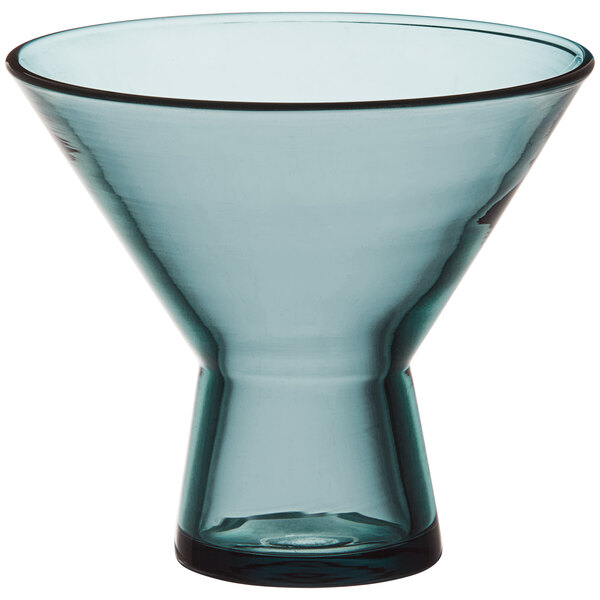 A close-up of an Acopa Pangea blue martini glass with a clear bottom.