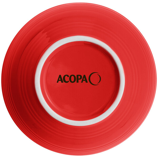 An Acopa Capri passion fruit red stoneware nappie bowl with a black circle and white letters on it.