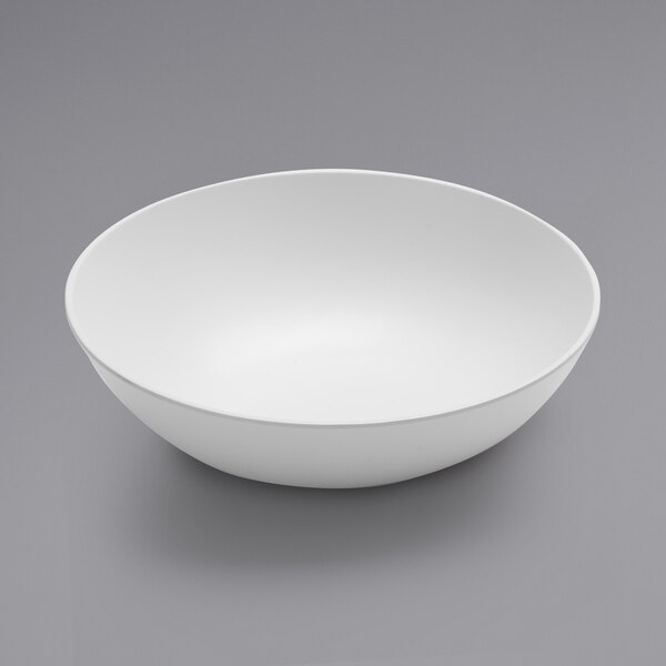 An American Metalcraft white melamine bowl on a gray surface.