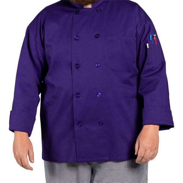 A man wearing a purple Uncommon Chef long sleeve chef coat.