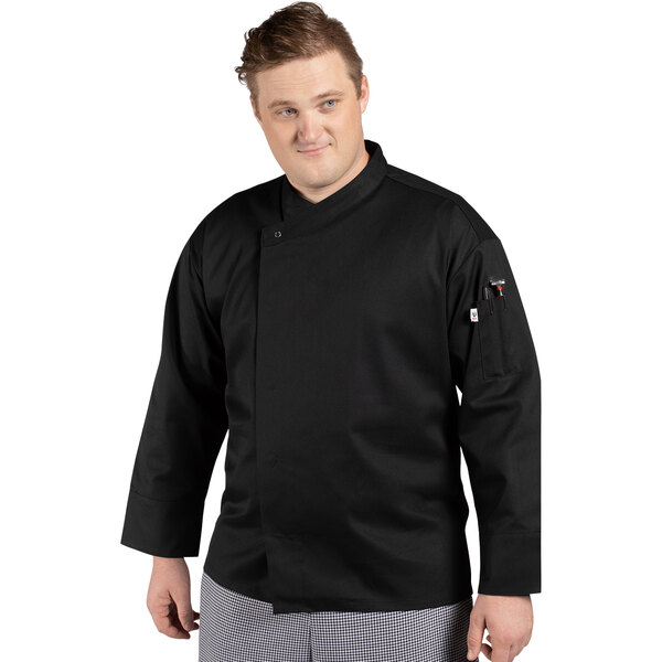 A man wearing a black Uncommon Chef long sleeve chef coat.