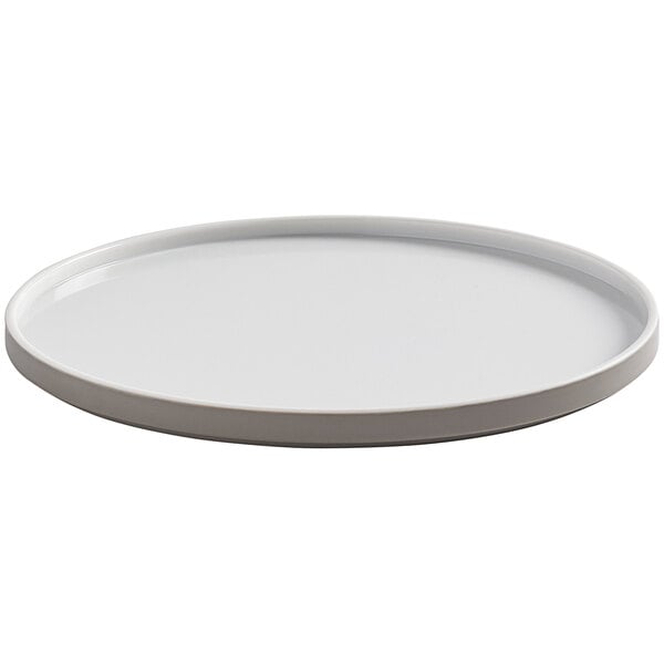 An American Metalcraft Unity 9" melamine mocha plate with a white rim.