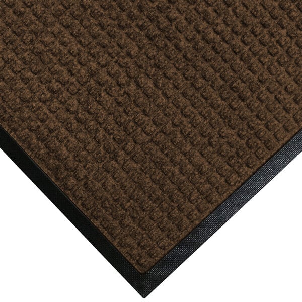 A dark brown WaterHog entrance mat with black rubber border.