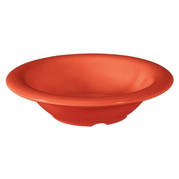 An orange melamine bowl with a red rim.