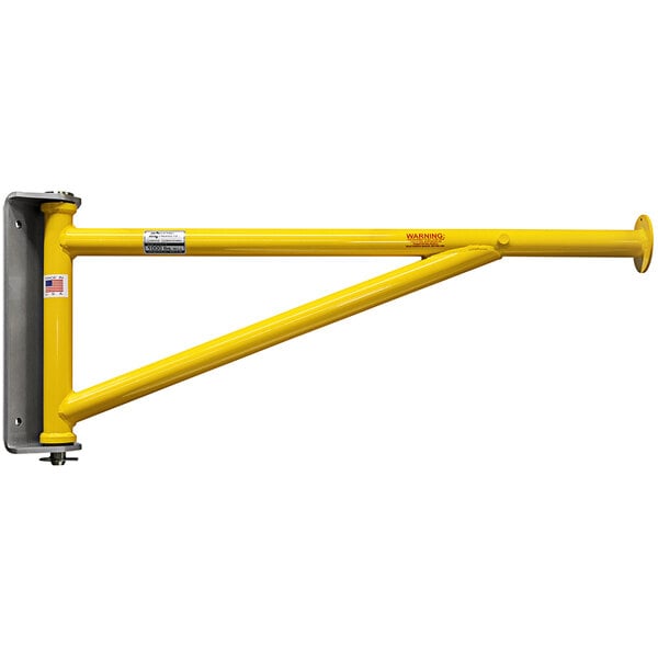 A yellow metal OZ Lifting Products wall mount bracket.